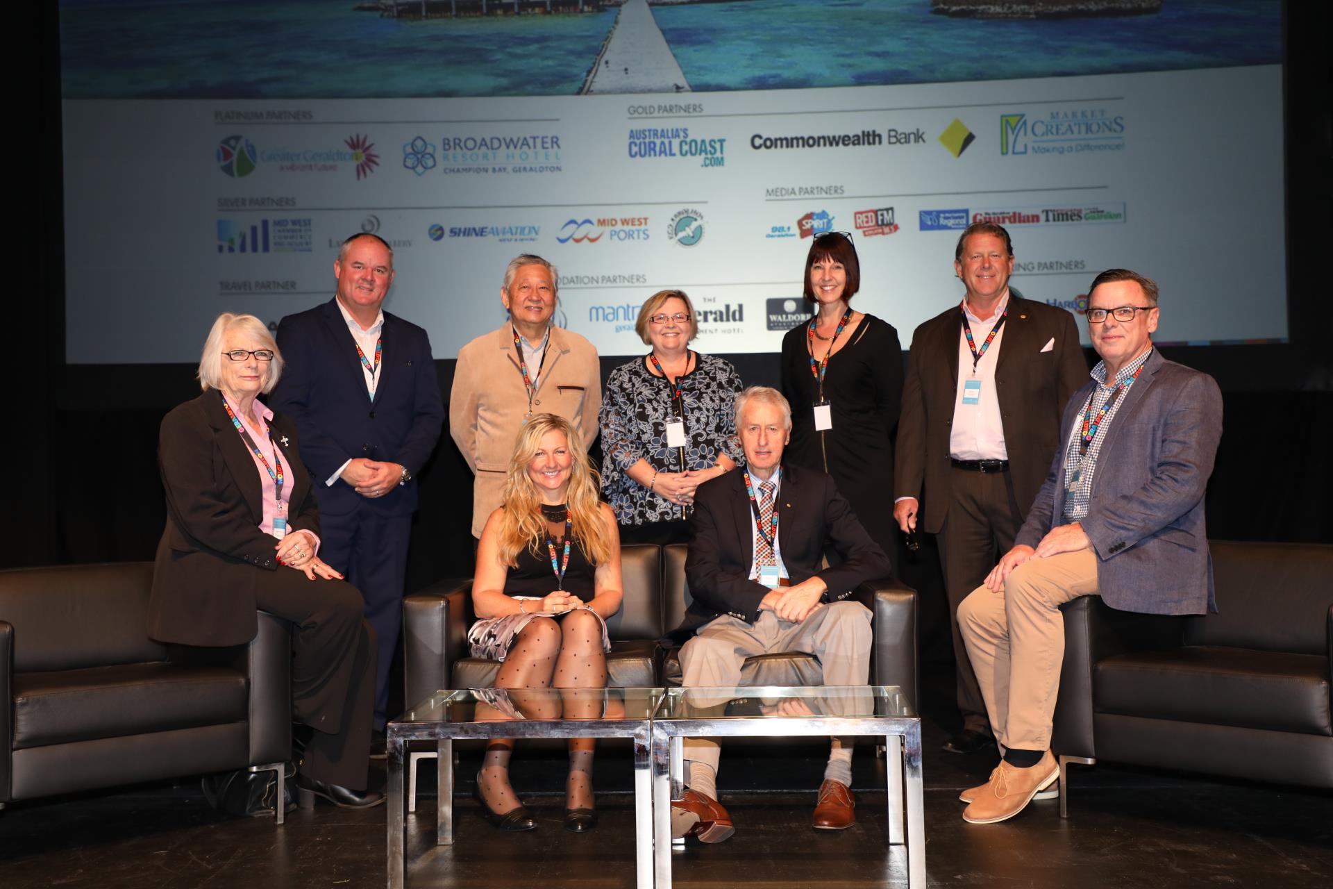 Key tourism industry experts on stage at the Summit
